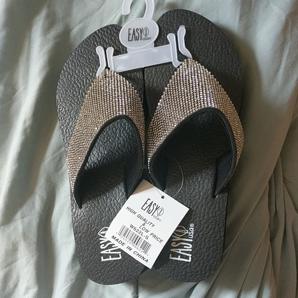 Black flip flops with silver